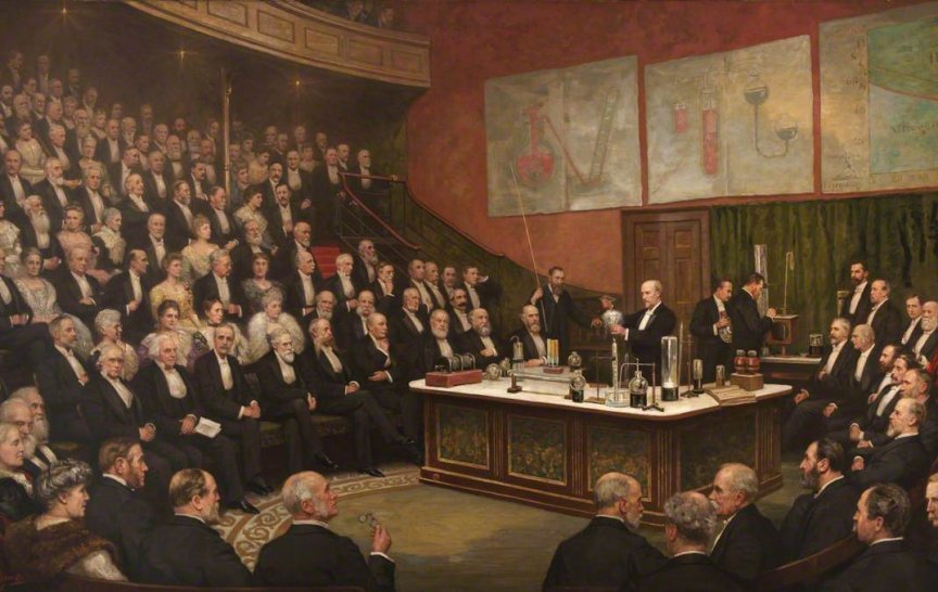 James Dewar v Royal Institution během přednášky o tekutém vodíku v roce 1904 (obrázek: Henry Jamyn Brooks, Public domain, via Wikimedia Commons)