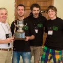 Bill Poucher (Executive Director ACM ICPC) s trofejí pro vítěze